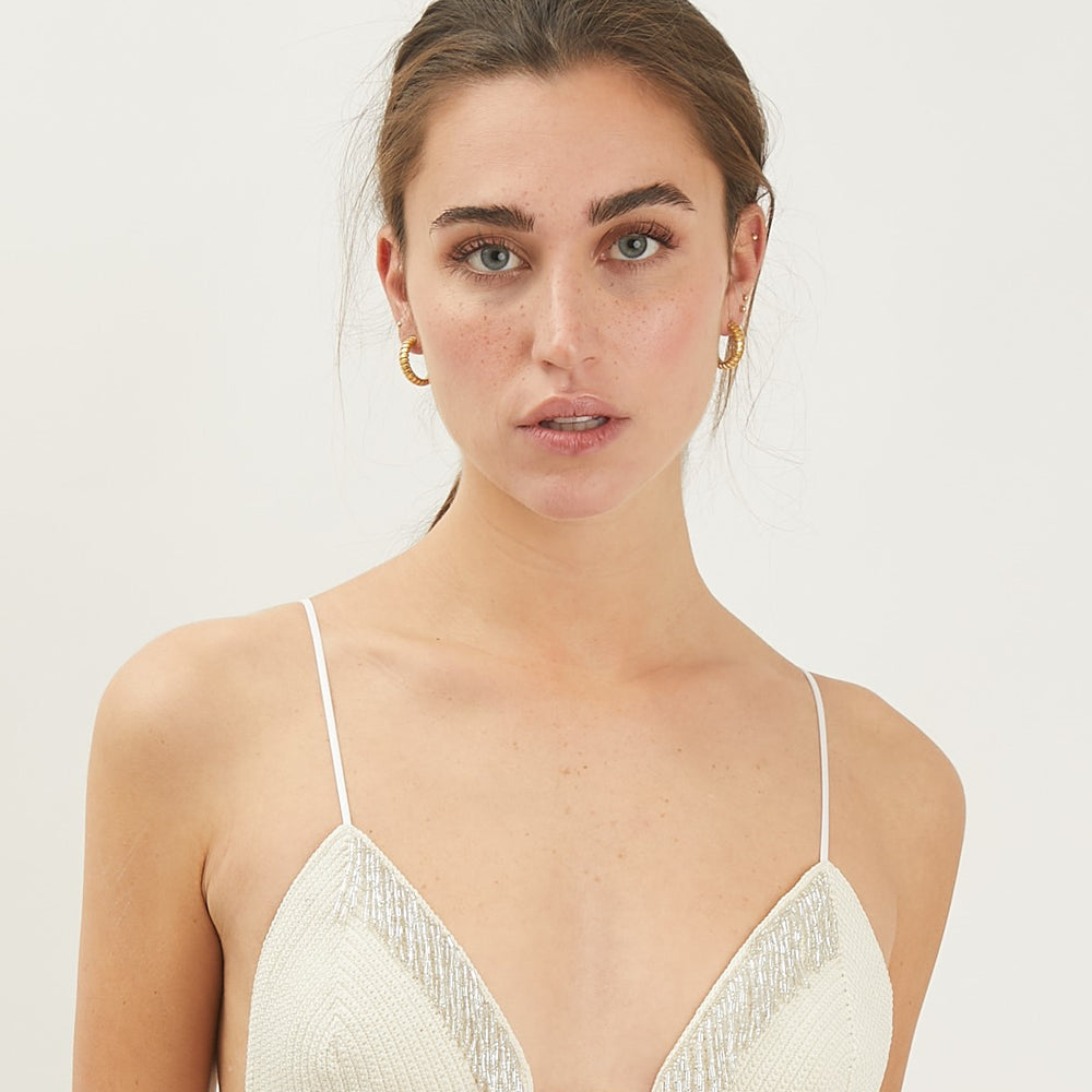 
                      
                        Orizzonte Luce - slip crochet
                      
                    